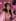 A woman with cat-ear headphones flashes a peace sign in a pink 'good vibes' streaming setup, before the 8-Bit Art Generator stylizes it.
