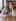 The same woman holds a filled red wine glass in place of her coffee cup, swapped by the Image Replace tool.