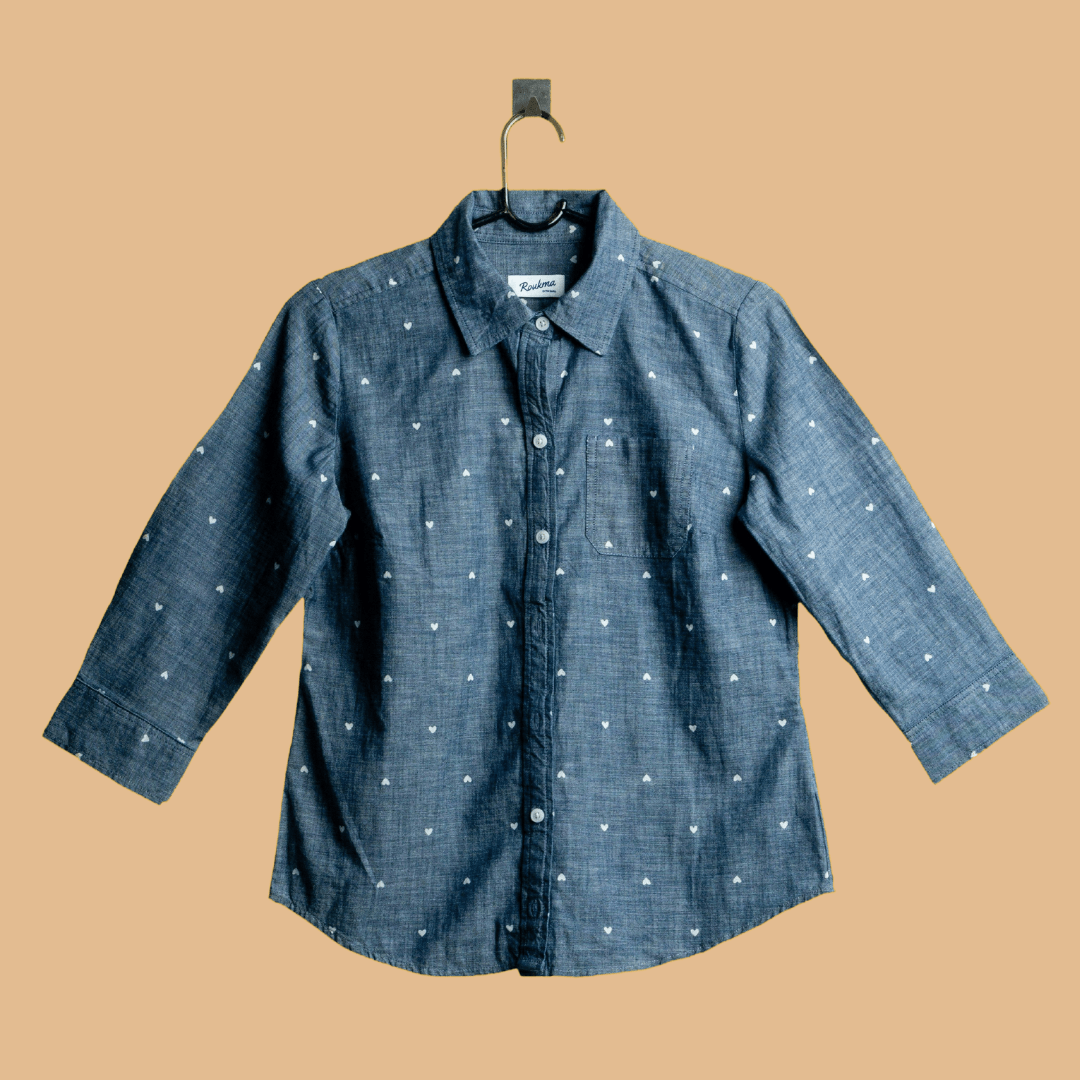 A shirt product photo on a brown background, created with the Background Changer.