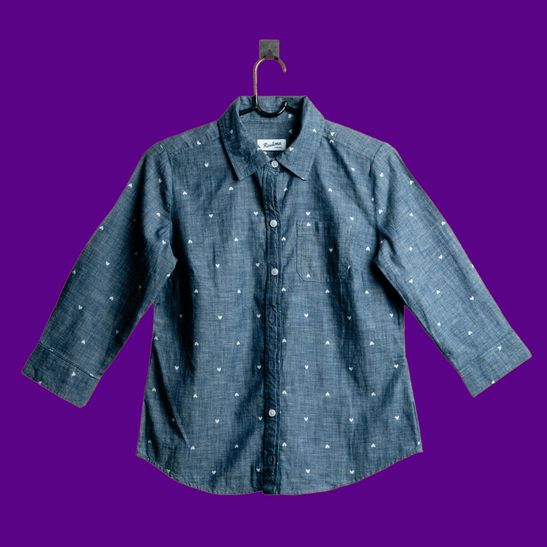 A shirt product photo on a purple background, created with the Background Changer.