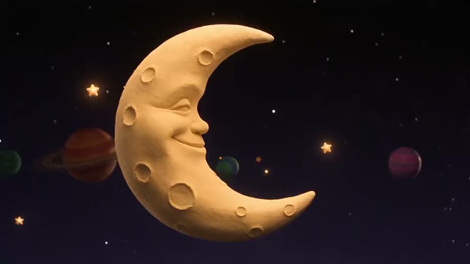 An AI claymation clip of a smiling crescent moon with a sleepy face floating among clay planets and glowing stars.